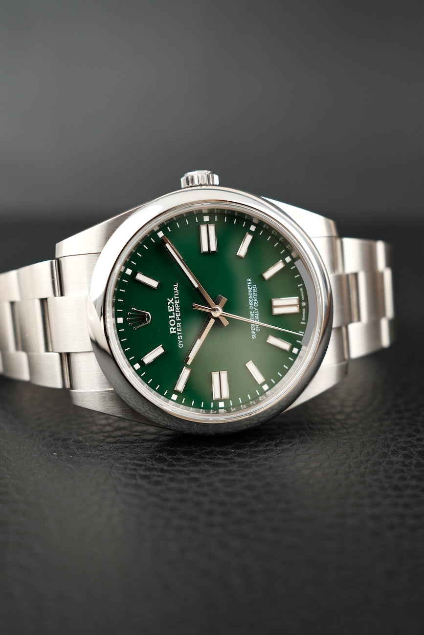 Rolex Oyster Perpetual 41 124300 Box + og. Papiere Green Dial