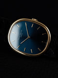 Carica l'immagine nel visualizzatore della galleria, Patek Philippe Ellipse 18k Yellow Gold 3848 Box + og. Papiere Metallic Blue Dial, Additional Extract
