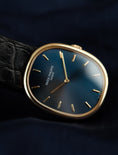 Carica l'immagine nel visualizzatore della galleria, Patek Philippe Ellipse 18k Yellow Gold 3848 Box + og. Papiere Metallic Blue Dial, Additional Extract
