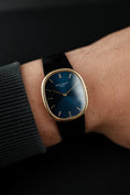 Carica l'immagine nel visualizzatore della galleria, Patek Philippe Ellipse 18k Yellow Gold 3848 Box + og. Papiere Metallic Blue Dial, Additional Extract
