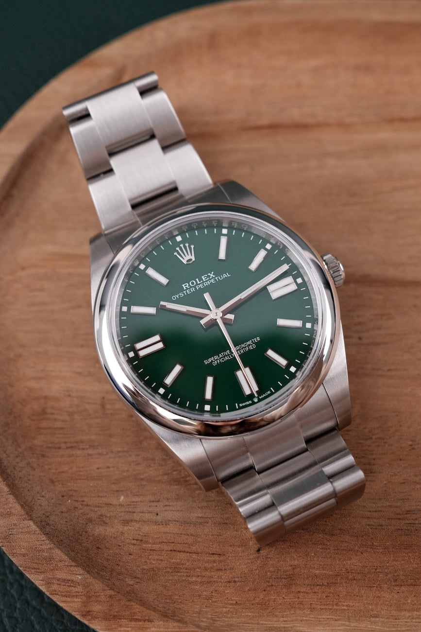 Rolex Oyster Perpetual 41 124300 Box + og. Papiere Green Dial, 41mm