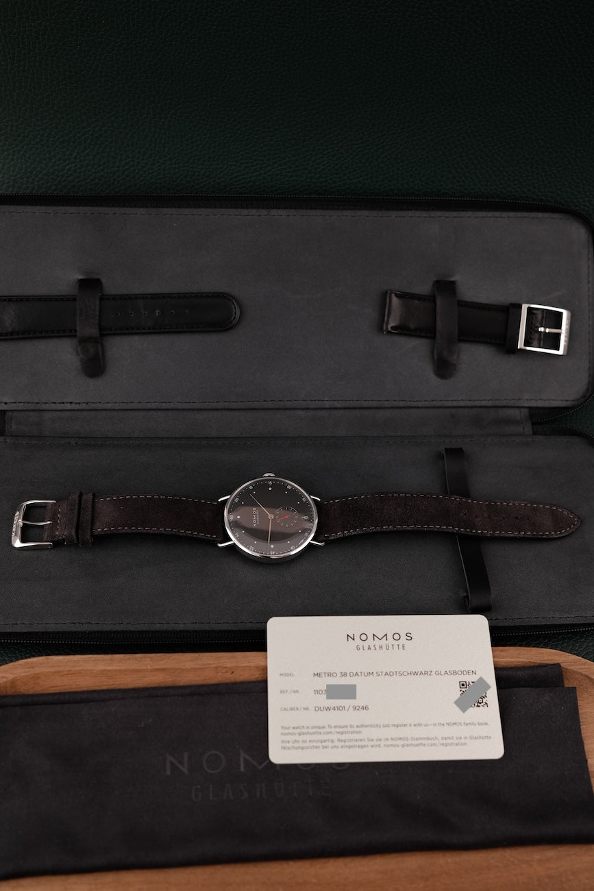 Nomos Metro 38 Stadtschwarz Datum 1103 Box + og. Papiere 38,5mm, German Delivered